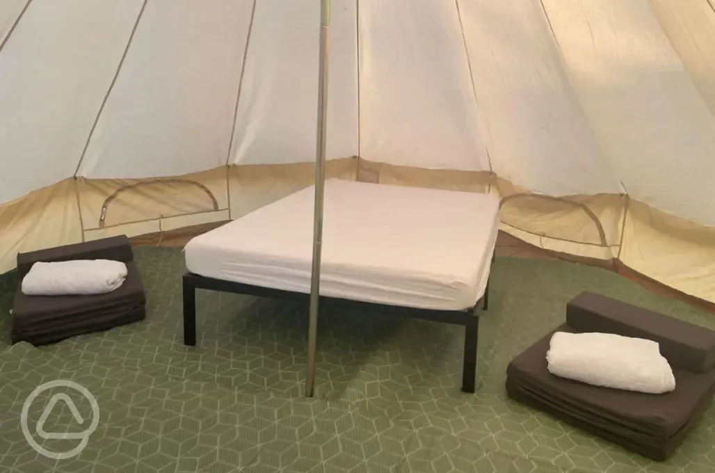 Part furnished bell tent interior 