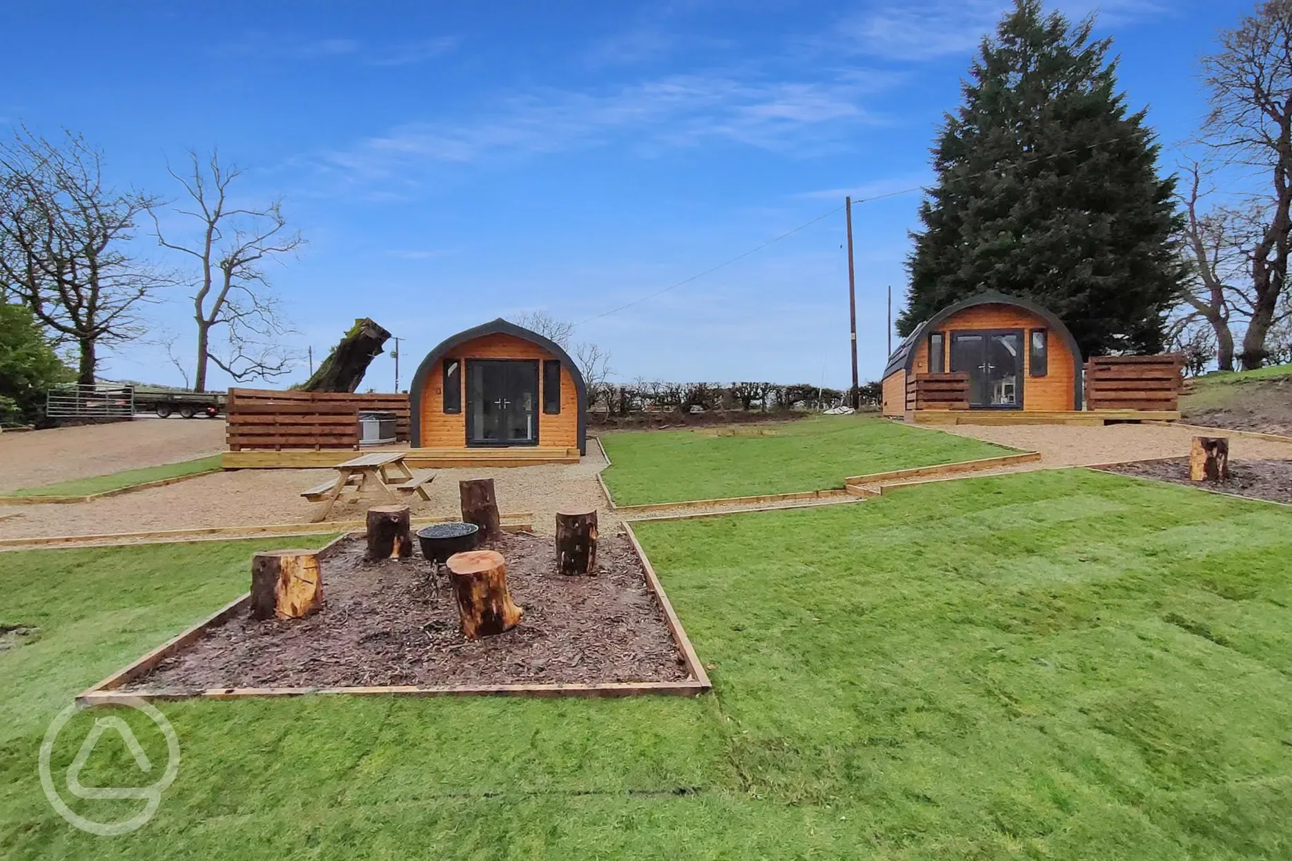 The Den and Roost glamping pod exteriors at Auchenhean Pods