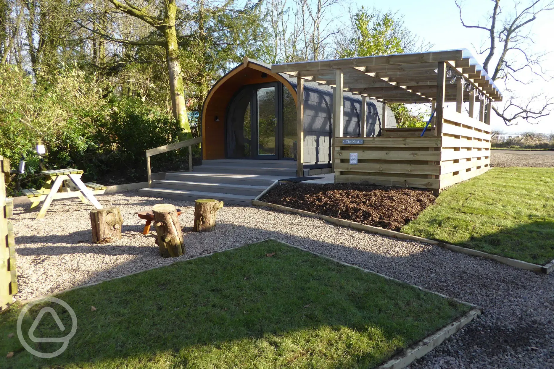 The Nest glamping pod exterior with private decking, sleeping up to two