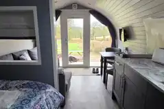 The Nest glamping pod interior with countryside views