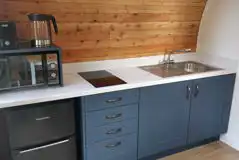 The Den and Roost glamping pod kitchen area