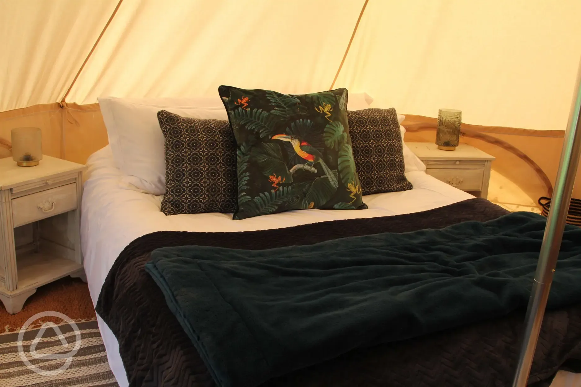 Double bed in bell tent