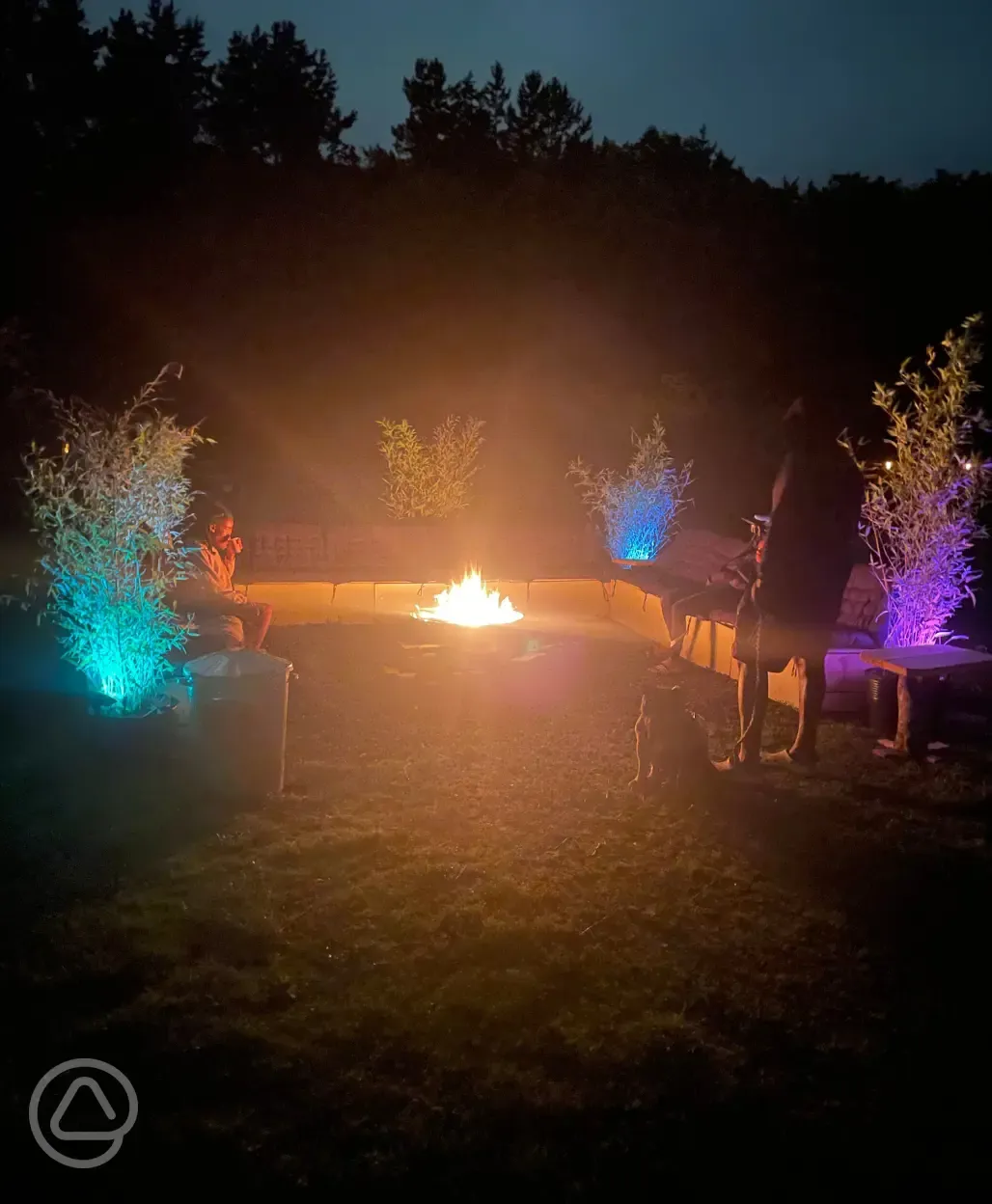 Communal fire pit at night