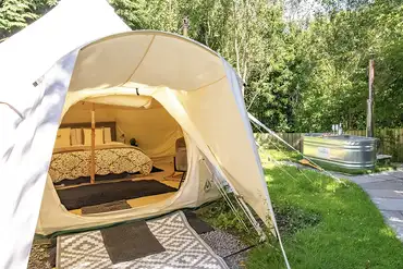Barn Owl bell tent with a private hot tub