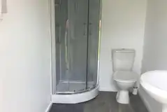 Private allocated shower rooms for the bell tents Private allocated shower rooms for the bell tents