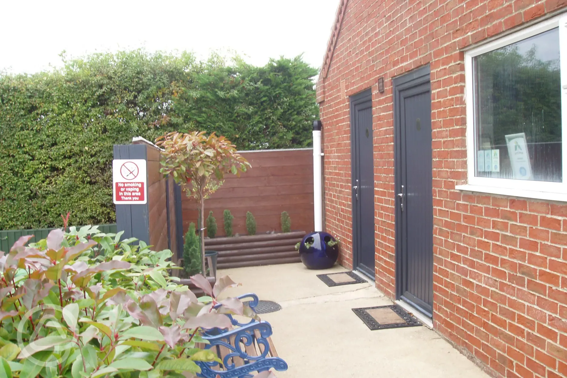 Area outside the toilet block with seating