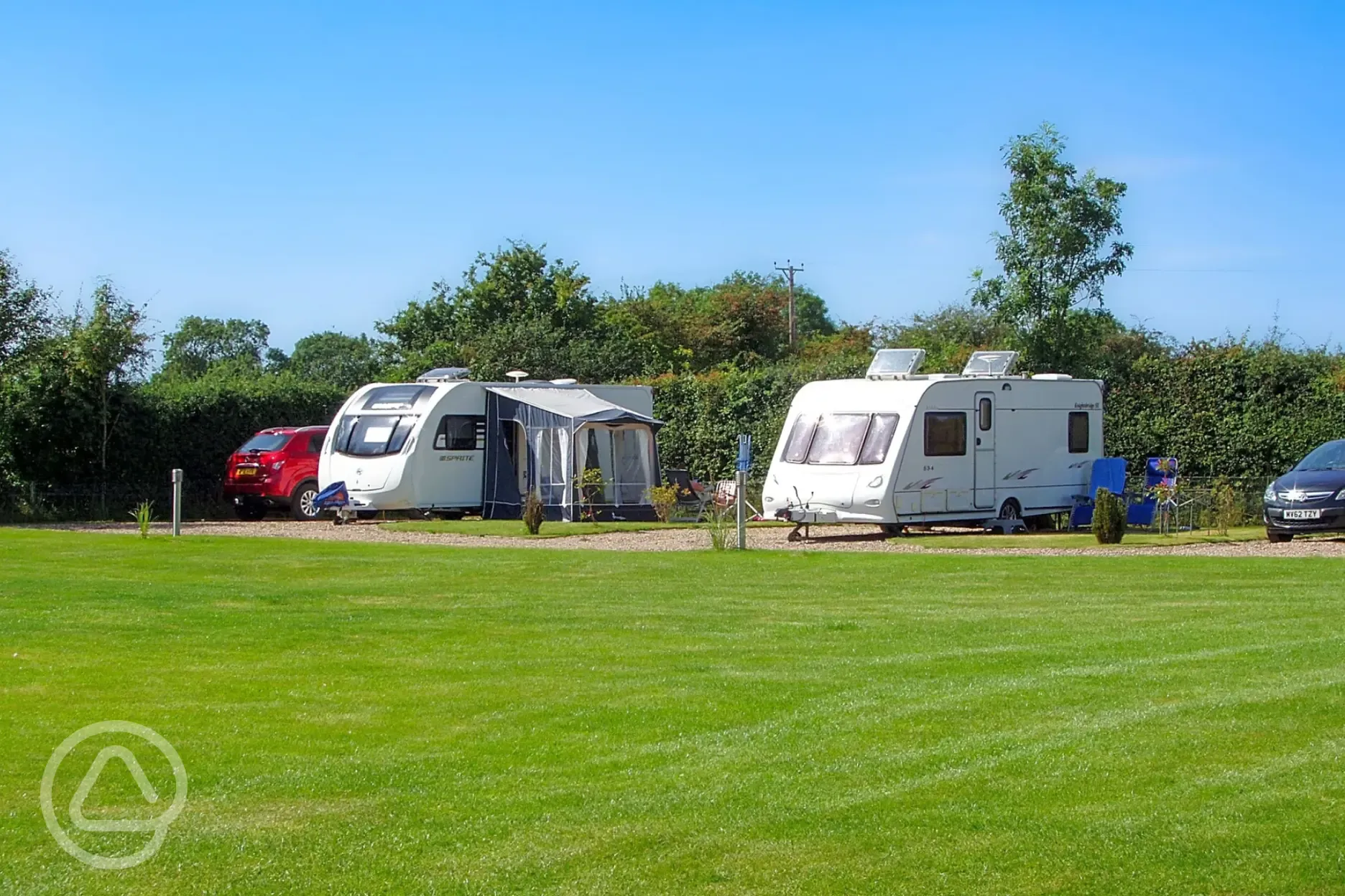 Electric hardstanding pitches at Pear Tree Cottage at Poplar Farm