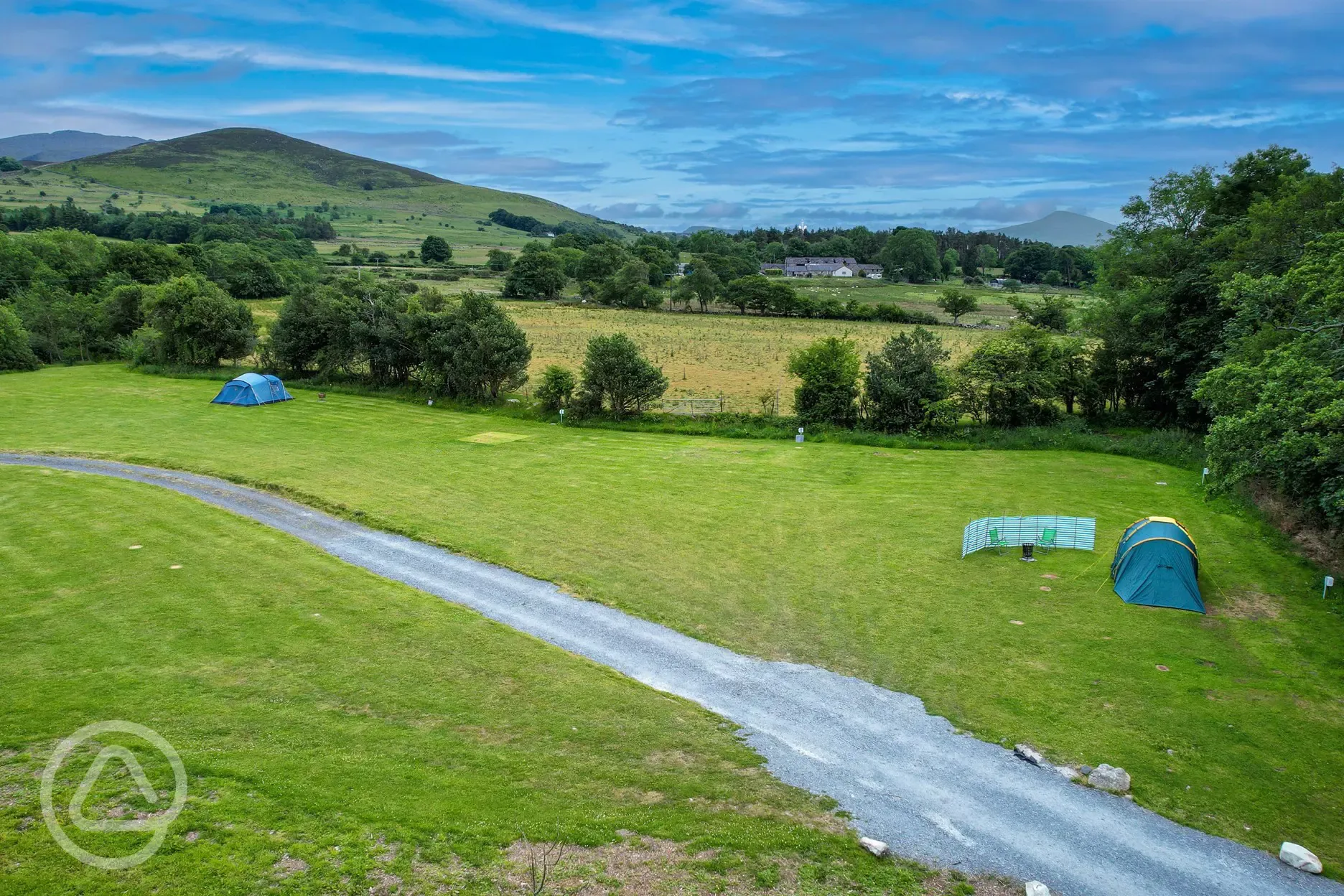 Grass tent pitches in the large camping field 