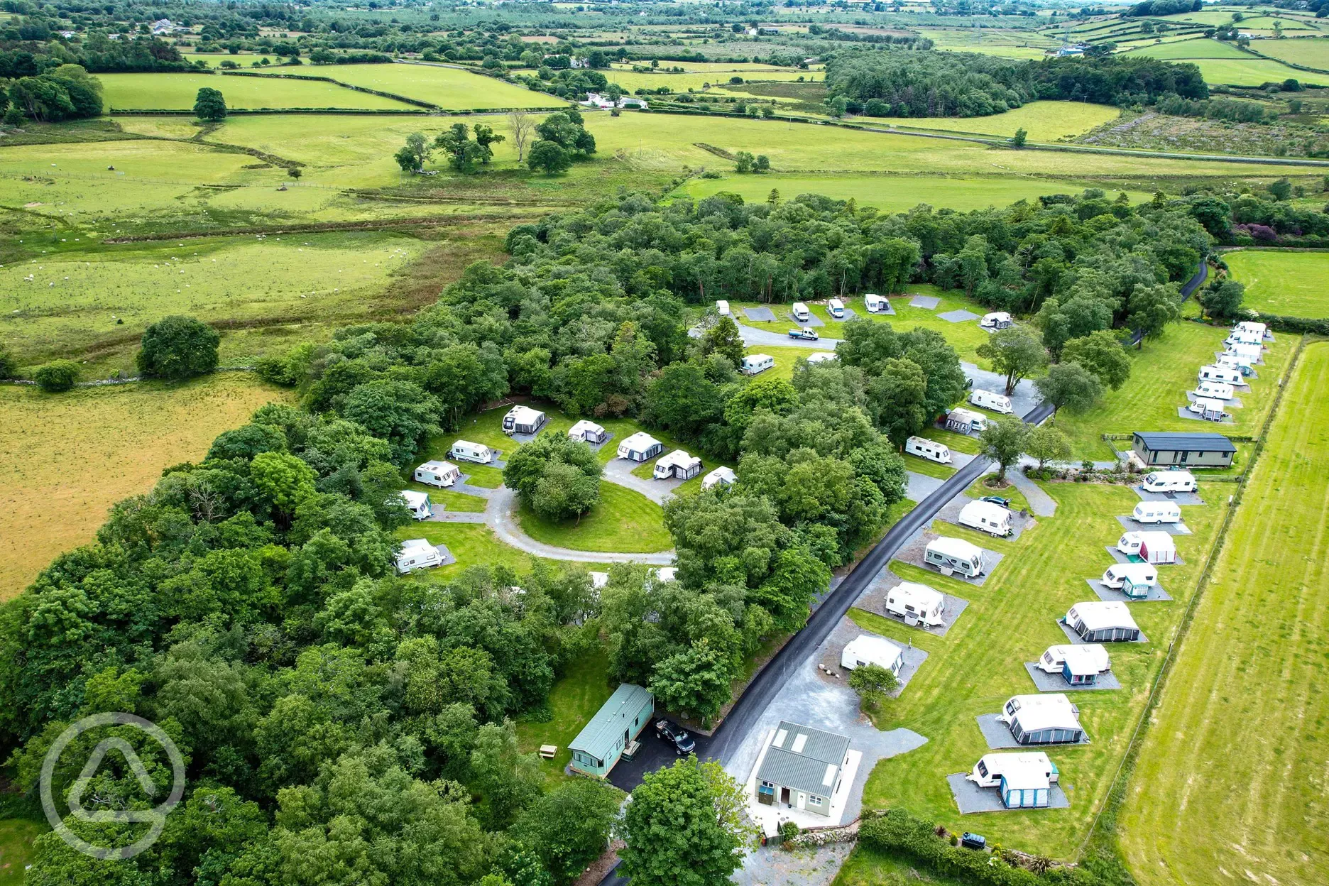 Aerial view of the campsites and woodland area