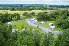 Electric hardstanding pitches surrounded by countryside 