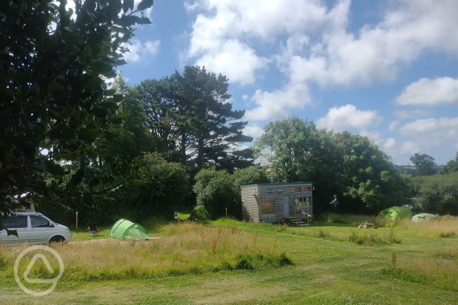 Grass pitches and tiny house 