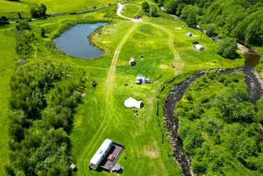Aerial of High Hall Campsite with a wildlife pond
