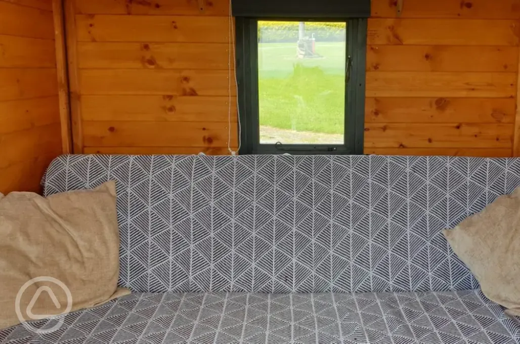 Camping pod convertible bed