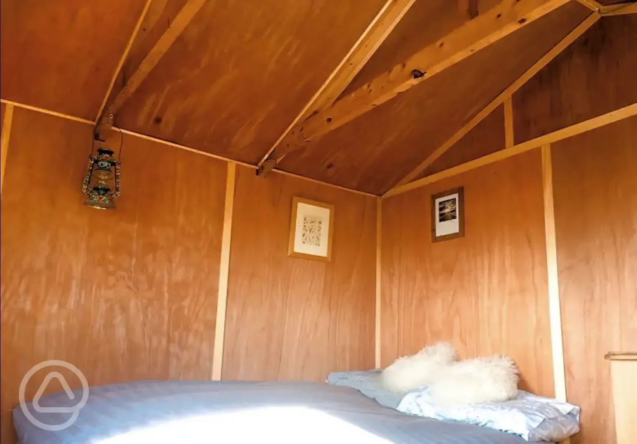 Wooden hut bedroom