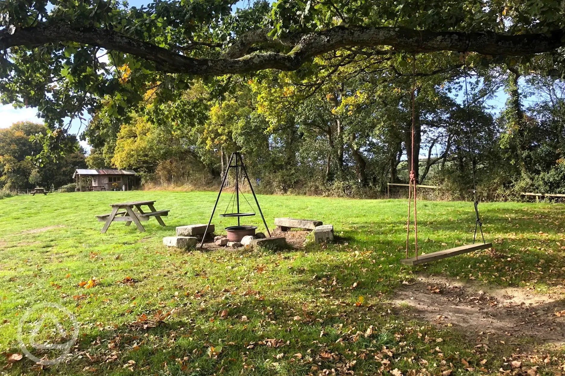 Communal fire pit on the camping field