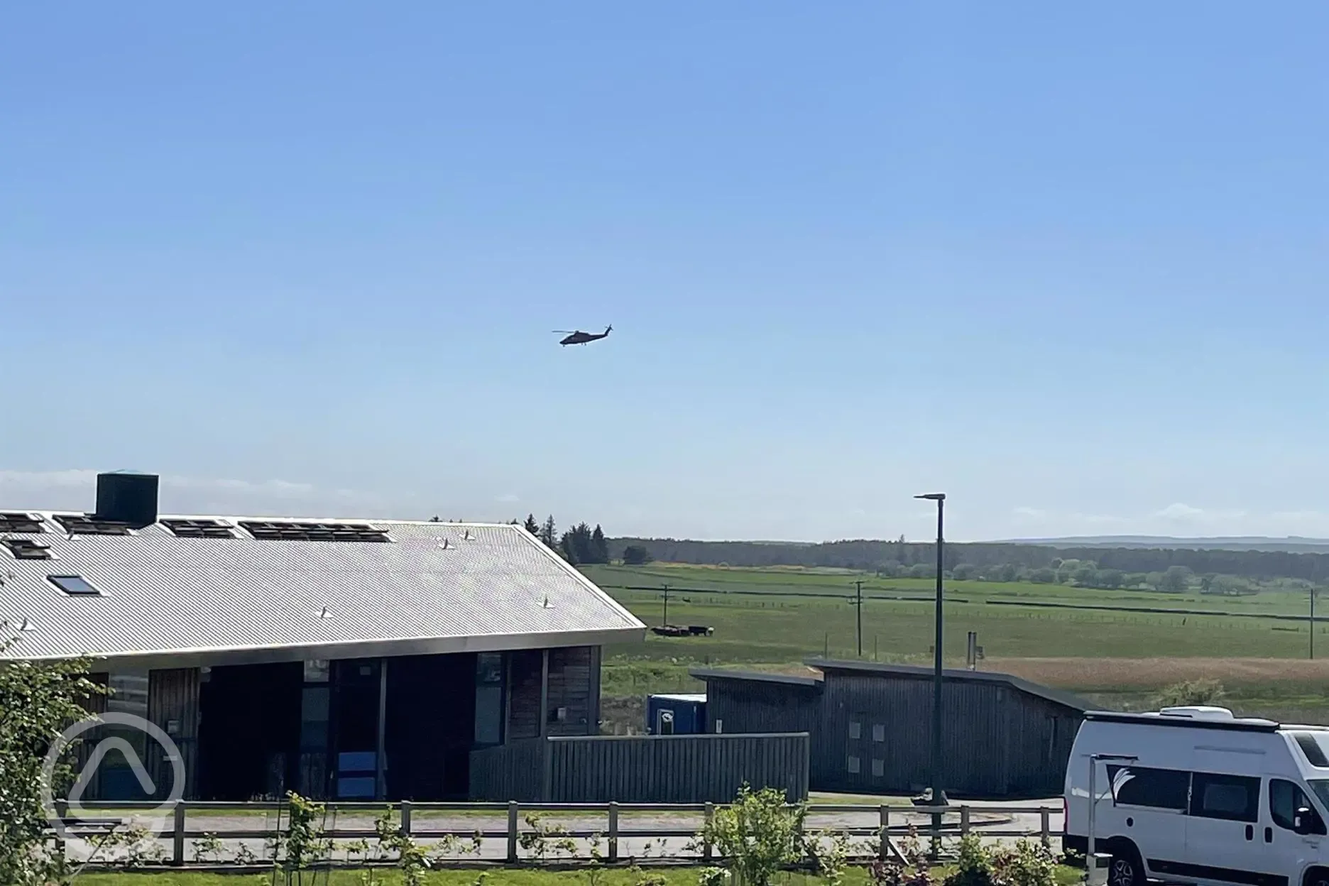 Helicopter flying past the site