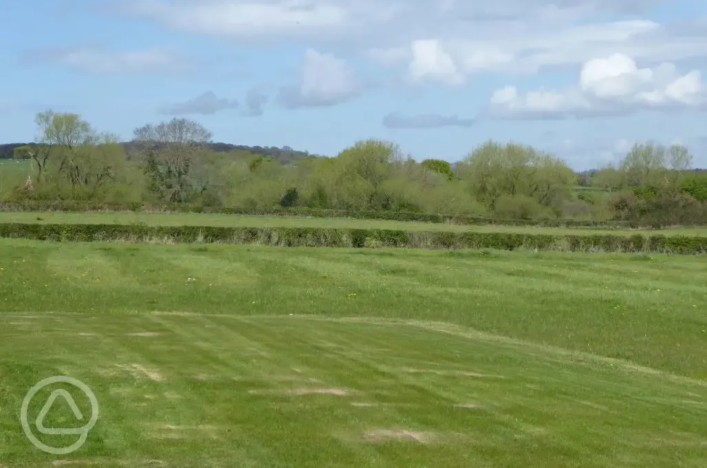Fields surrounding the ensuite glamping pods 