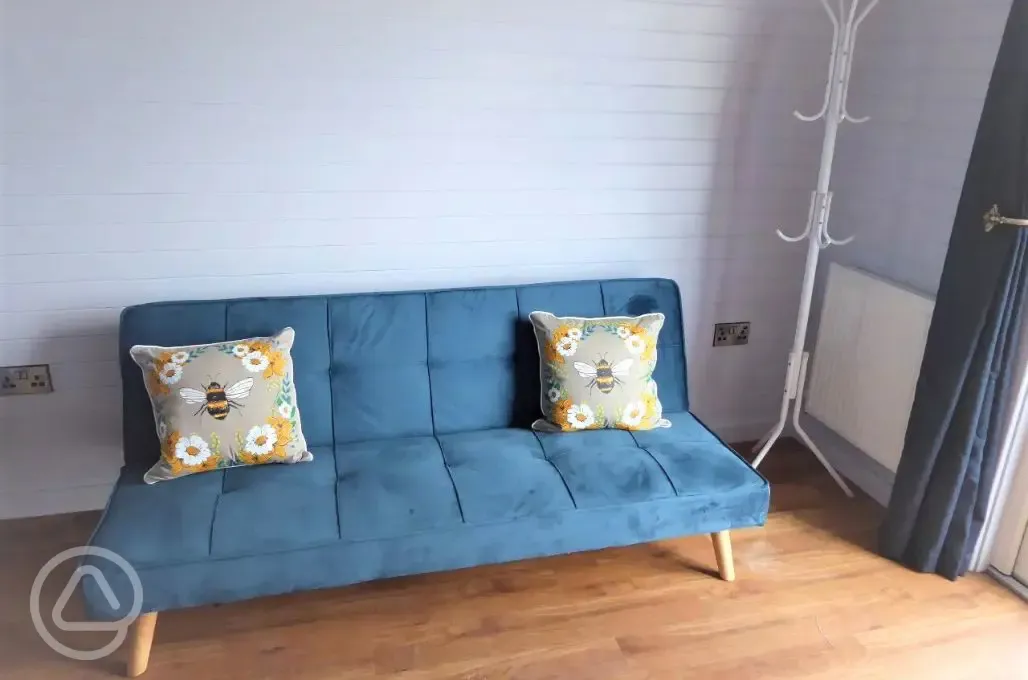 Ensuite glamping pod sofa