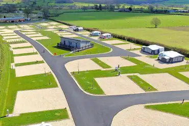 Aerial of Meadow Springs Country and Leisure Park with hardstanding pitches