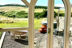 Heather ensuite pod views and wood-fired hot tub with outdoor seating Heather ensuite pod views and wood-fired hot tub with outdoor seating