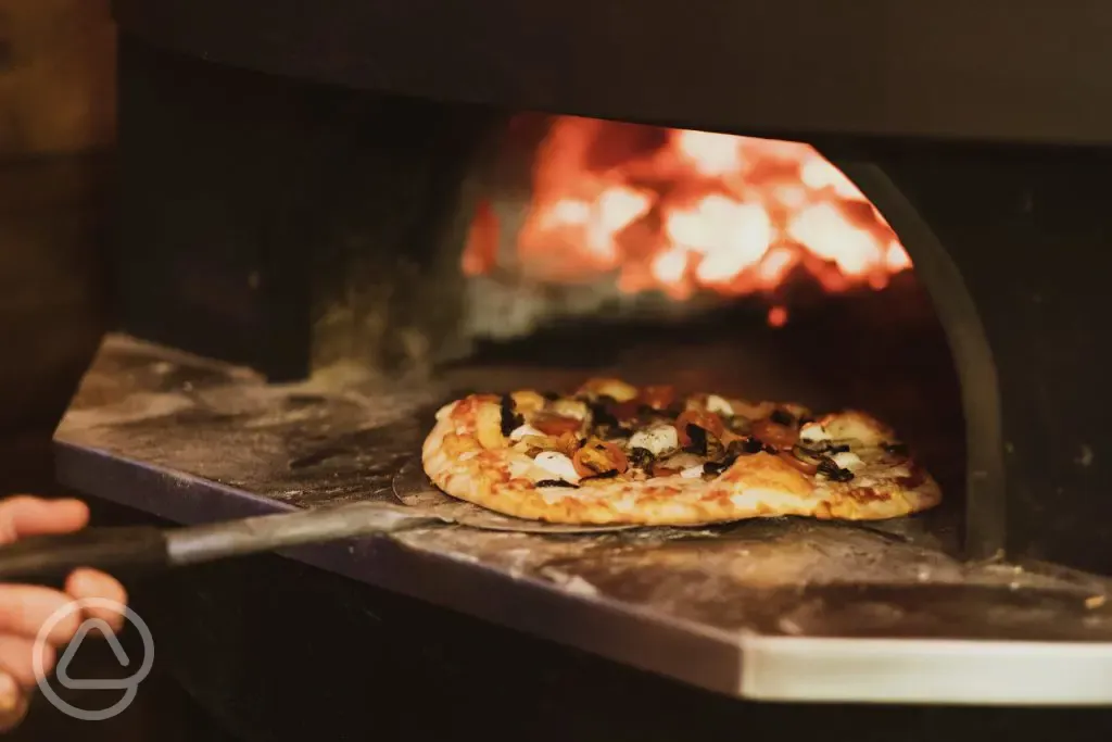 Wood-fired pizza oven available to hire at Maycroft Retreat