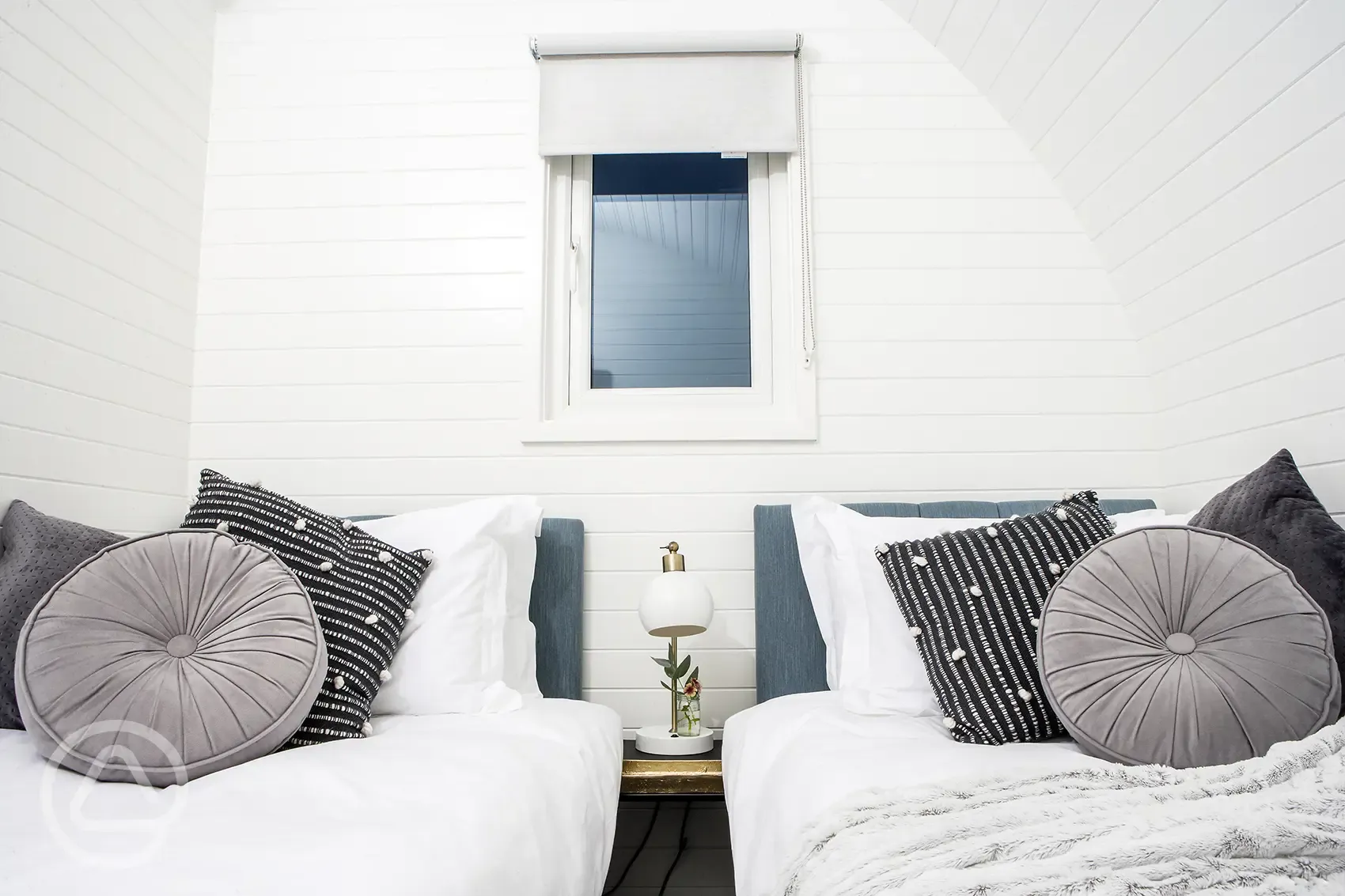 White Clover ensuite pod twin beds in a separate room (bedding provided)