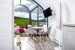 White Clover ensuite pod dining area with a coat stand and Smart TV White Clover ensuite pod dining area with a coat stand and Smart TV