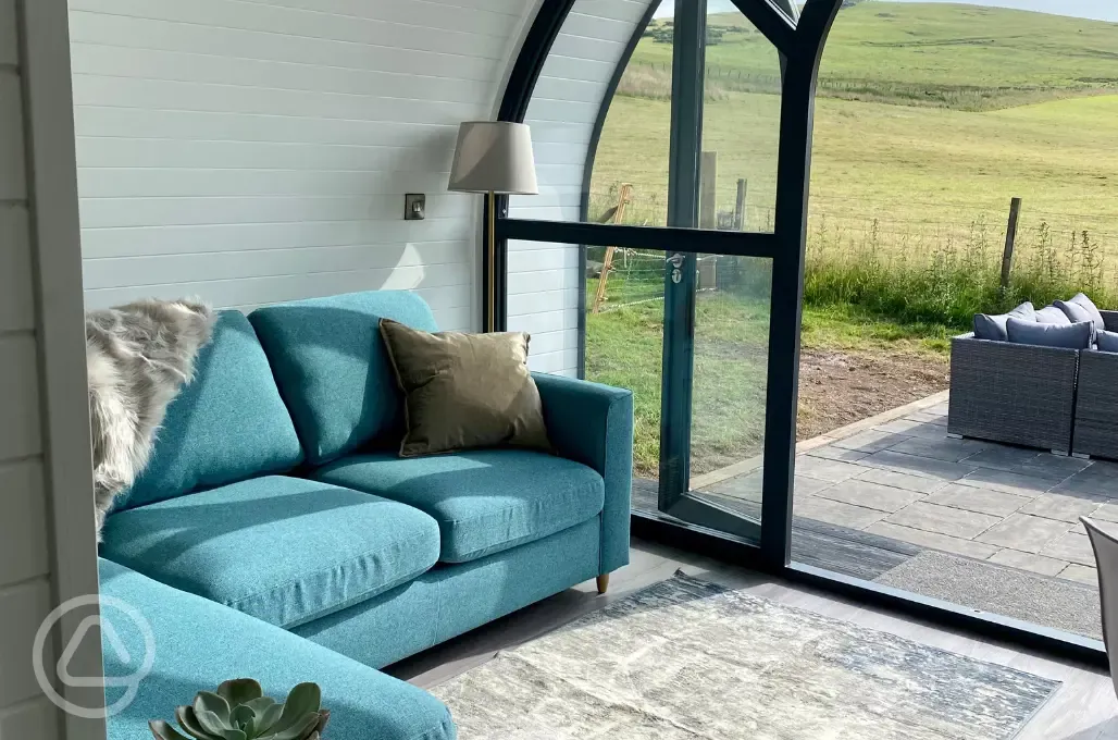 White Clover ensuite pod sofa area overlooking countryside views