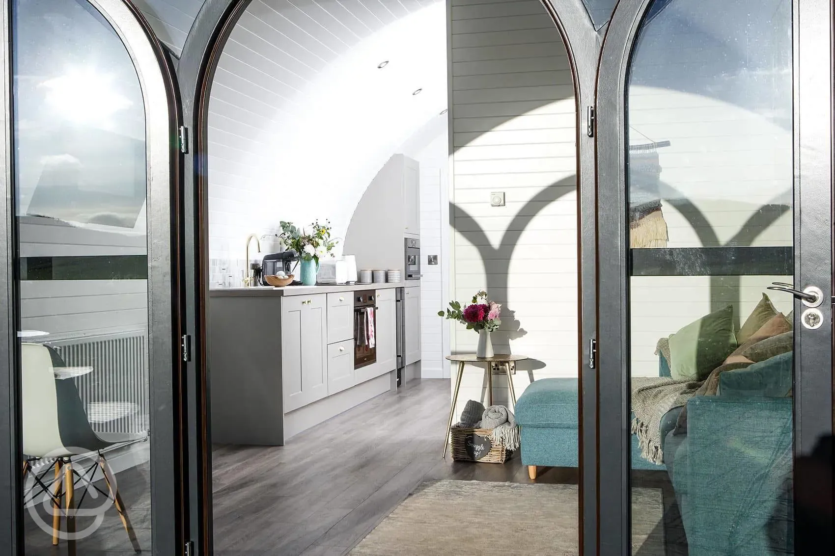White Clover ensuite pod living area with dining space and kitchen
