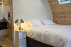 Double bed in the family sized ensuite glamping pod (bedding included)