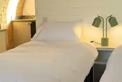 Accessible glamping pod interior with super king bed or two singles