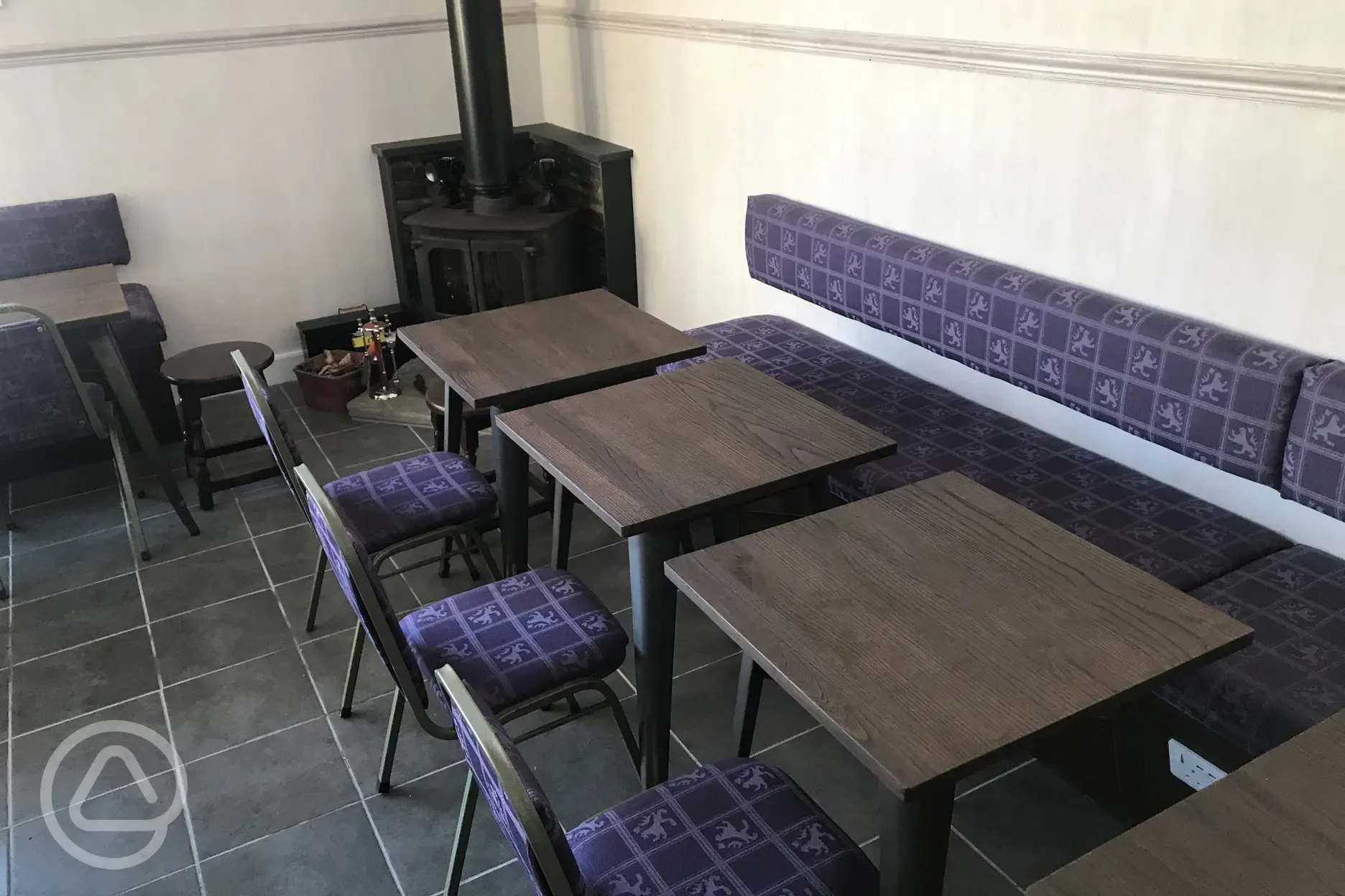 Cafe indoor seating area and woodburner