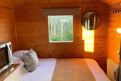 Shepherd's hut double bed with bedding provided Shepherd's hut double bed with bedding provided