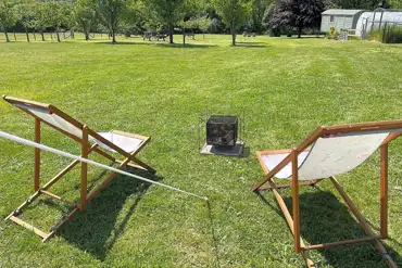 Non electric grass pitches with raised fire pits welcome
