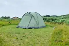 Small non electric grass tent pitch