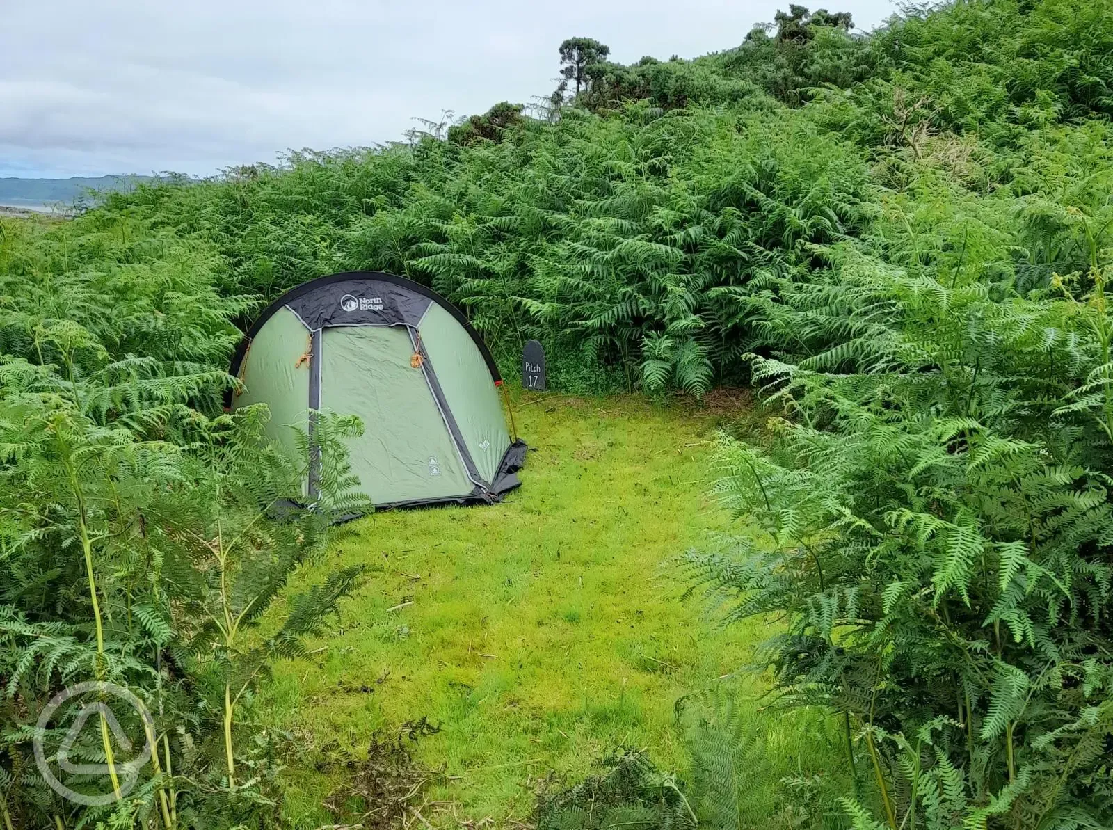 Small non electric grass tent pitch