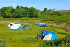 Small non electric grass tent pitches