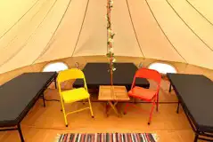 Bell tent interior, sleeping up to five
