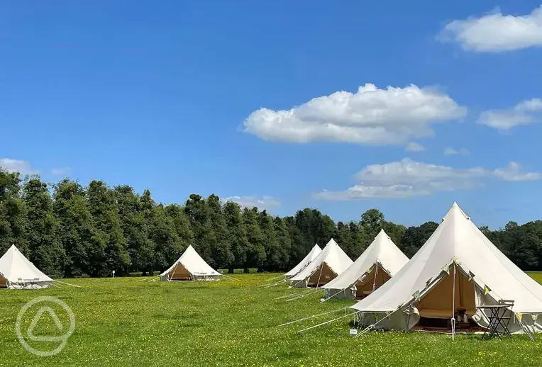 Bell tents sleeping up to give at The Old Airfield