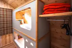 Chimpanzee large ensuite glamping pod bunk beds and wardrobe space