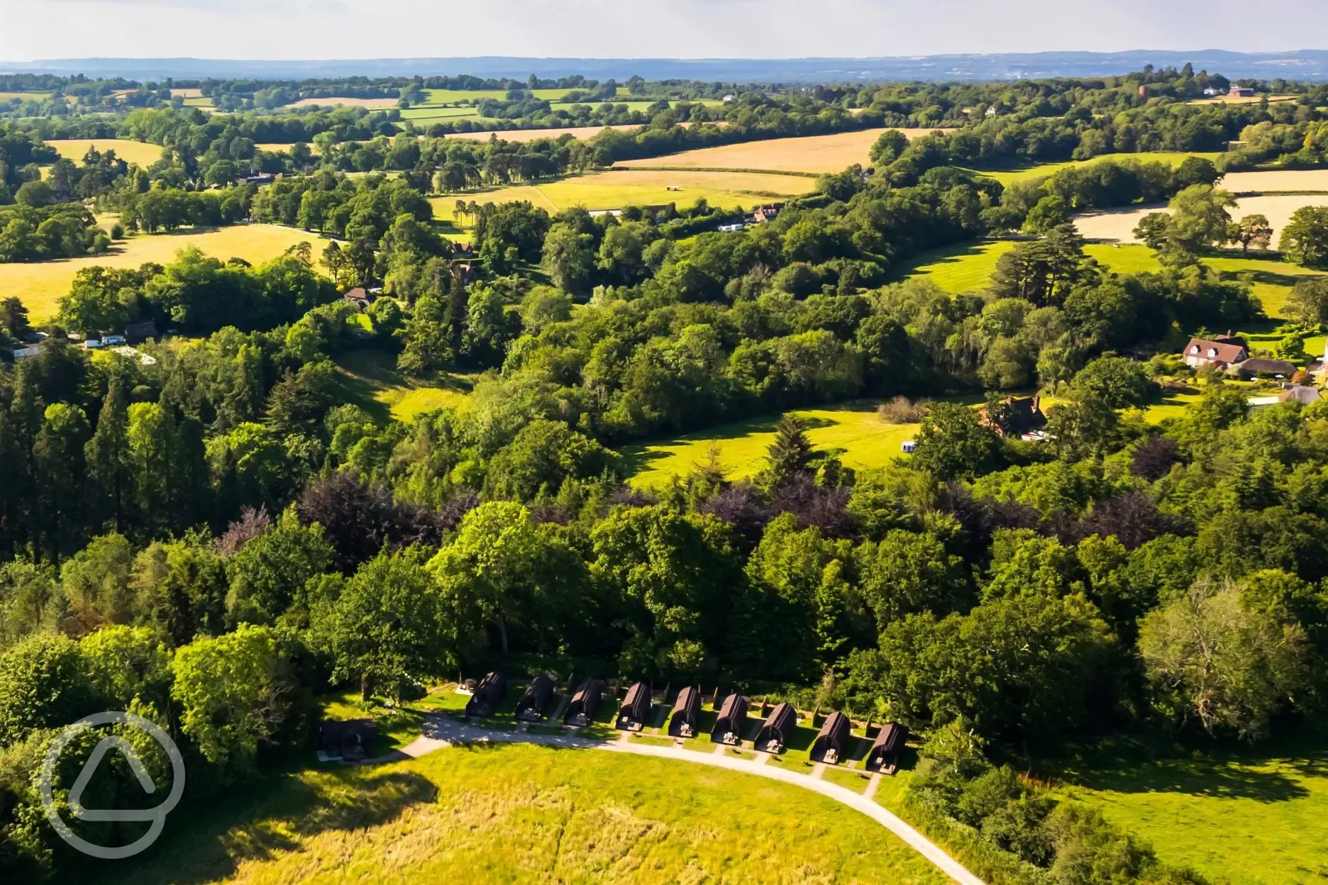 Aerial of the glamping pods at Missing Link Glamping in countryside surroundings