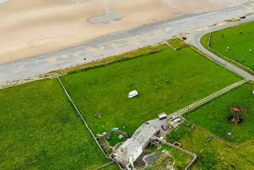 Aerial of the hardstanding pitches and beach