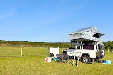 Non electric grass pitches with roof tents welcome