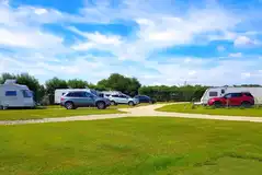 Fully serviced hardstanding pitches with space for a parked car Fully serviced hardstanding pitches with space for a parked car