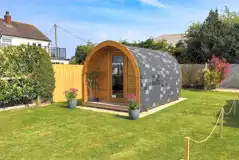 Camping pod with a small garden area