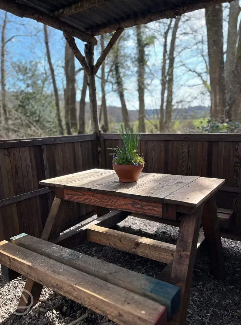 The Badgers Burrow exterior picnic bench