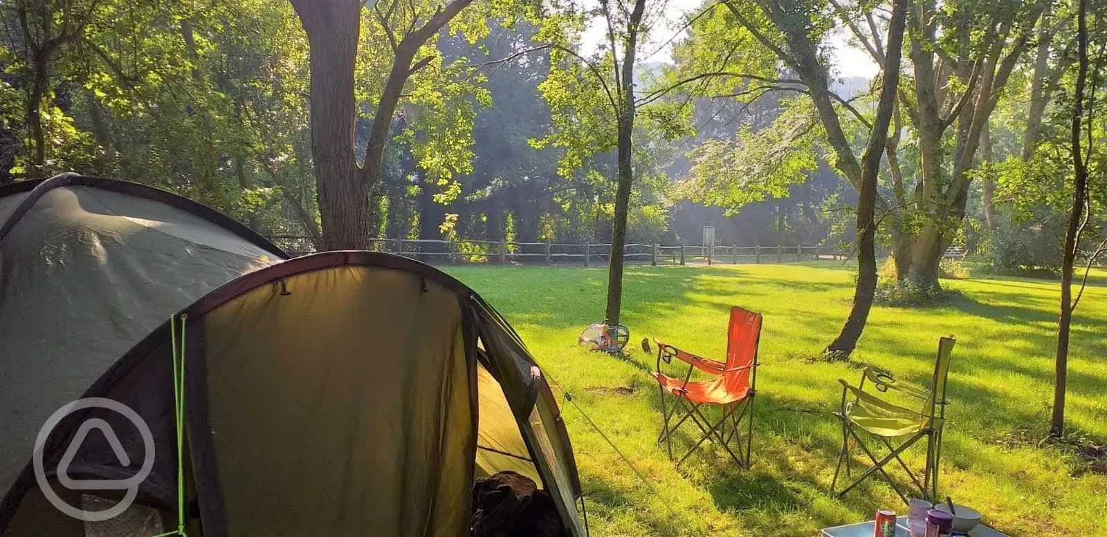 Camping electric grass pitches with fire-pit