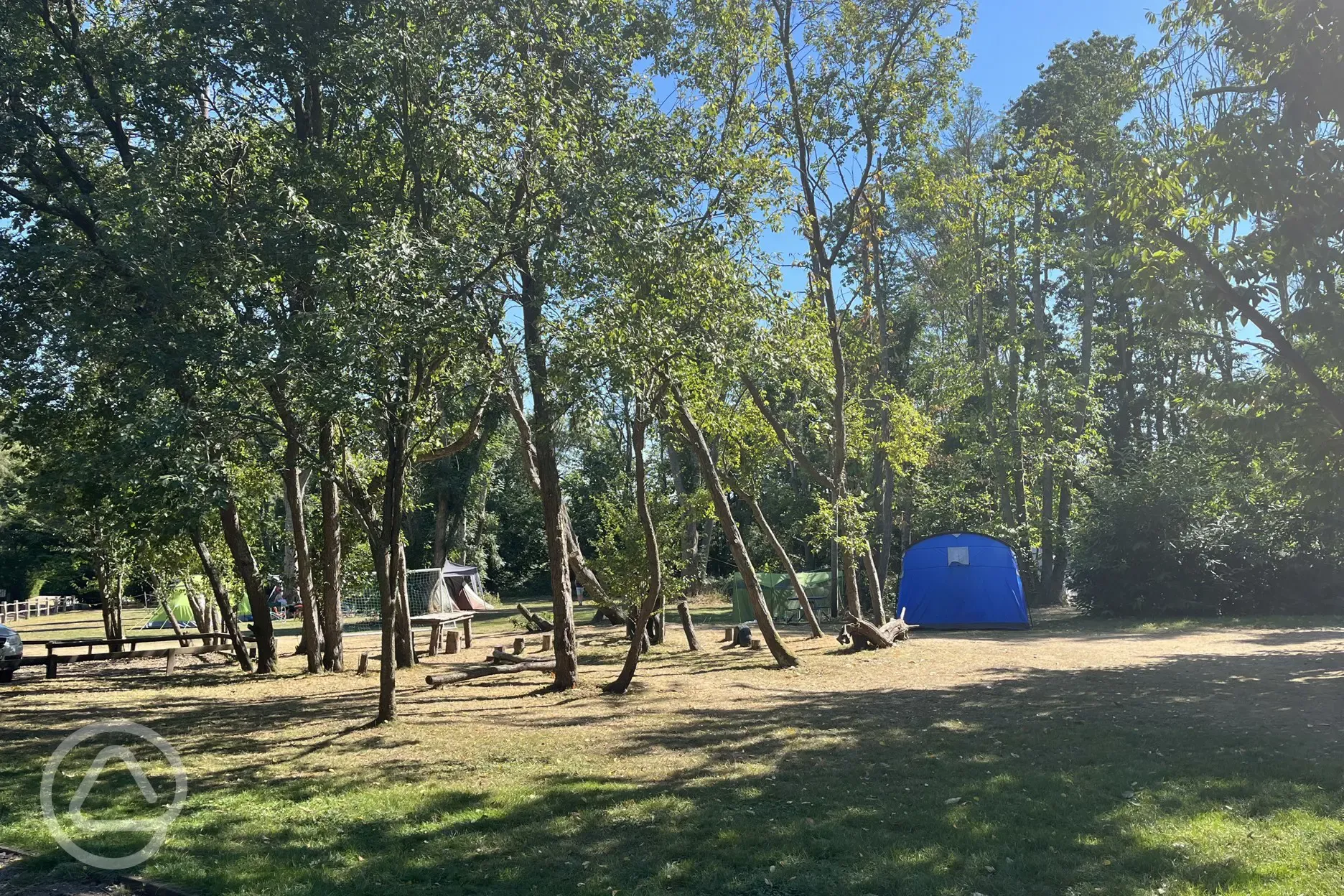 Camping electric grass pitches with fire-pit
