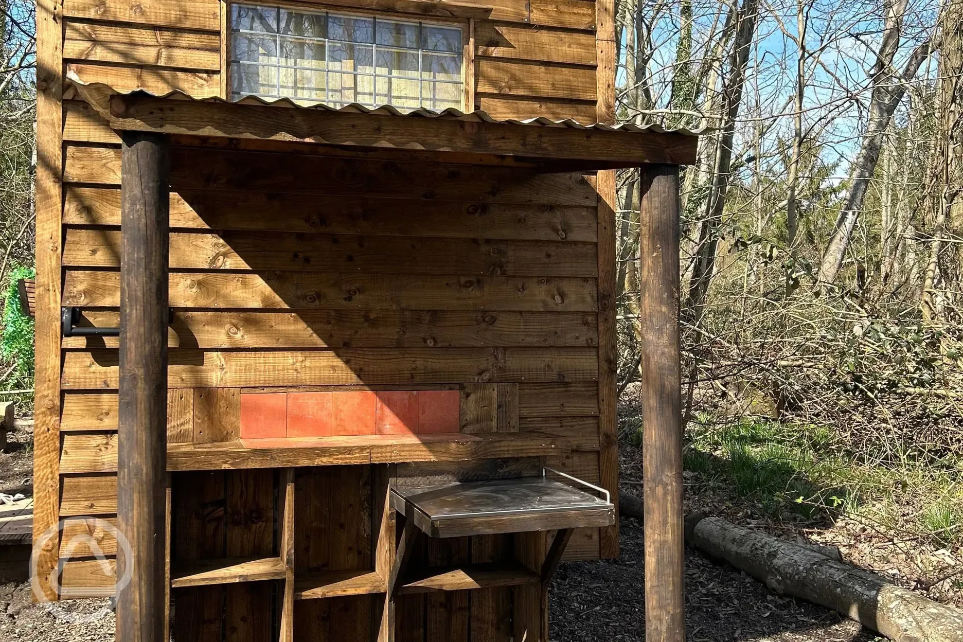 The Badgers Burrow Hut glamping cabin kitchen prep area