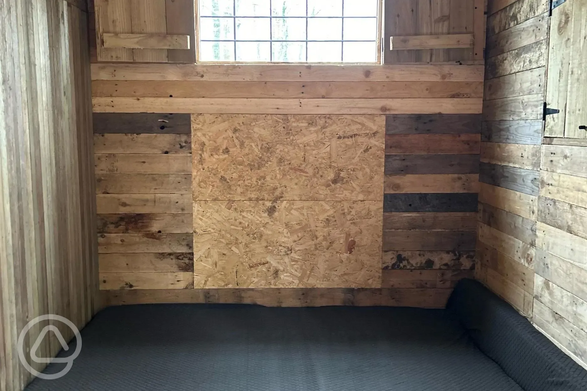 The Badgers Burrow glamping cabin interior